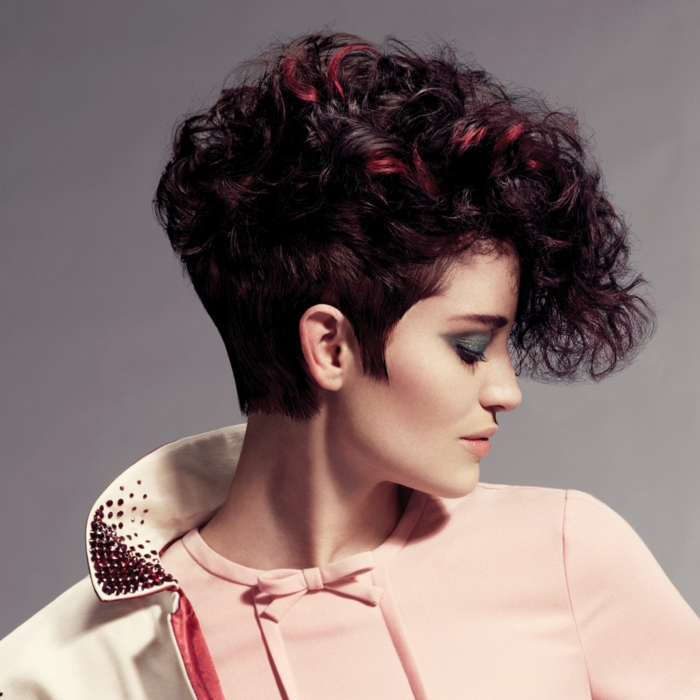 Very short curly haircut Red-haired woman with a pixie cut small size
