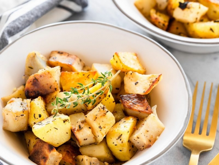 roasted potatoes with basil thyme and garlic potato recipes as side dish scaled