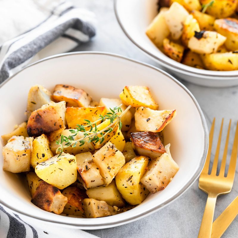 roasted potatoes with basil thyme and garlic potato recipes as side dish scaled