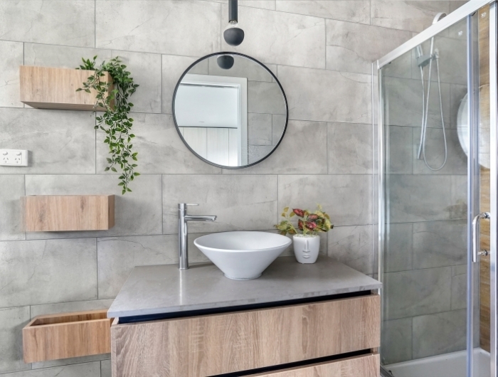 carrelage effet béton salle de bain moderne rangement bois