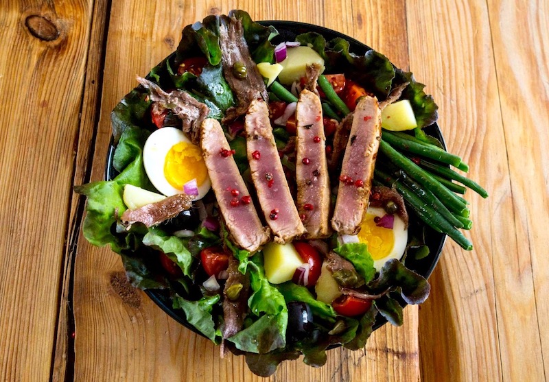 Nicoise salad with tuna eggs green beans green salad