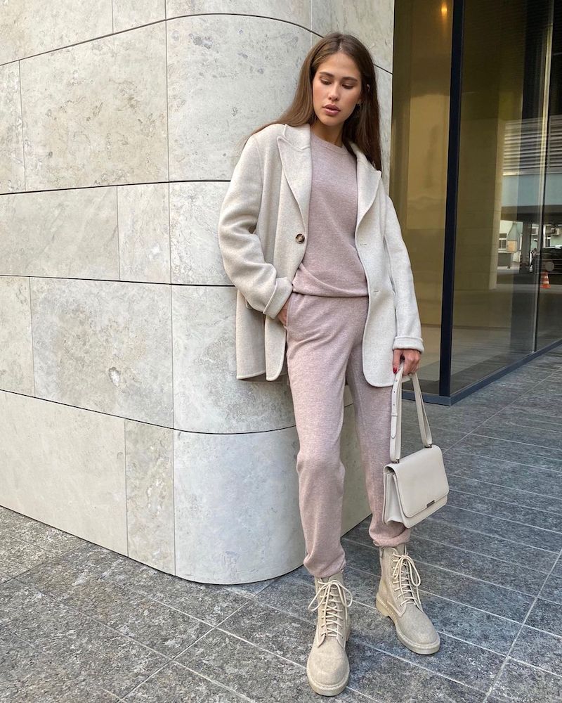 autumn 2021 trend outfit in powder pink beige ankle boots gray jacket