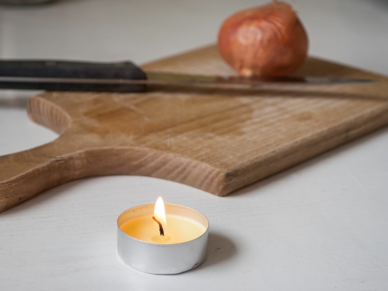 why onions make you cry cut an onion with a candle