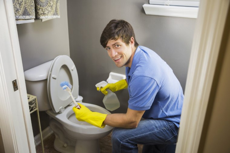 man doing housework, cleaning bathroom toilet #2