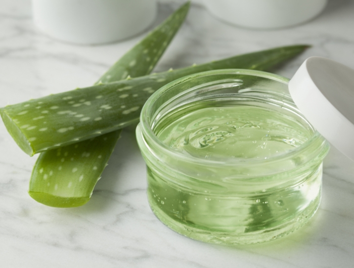 aloe vera gel in a glass jar for cosmetic use