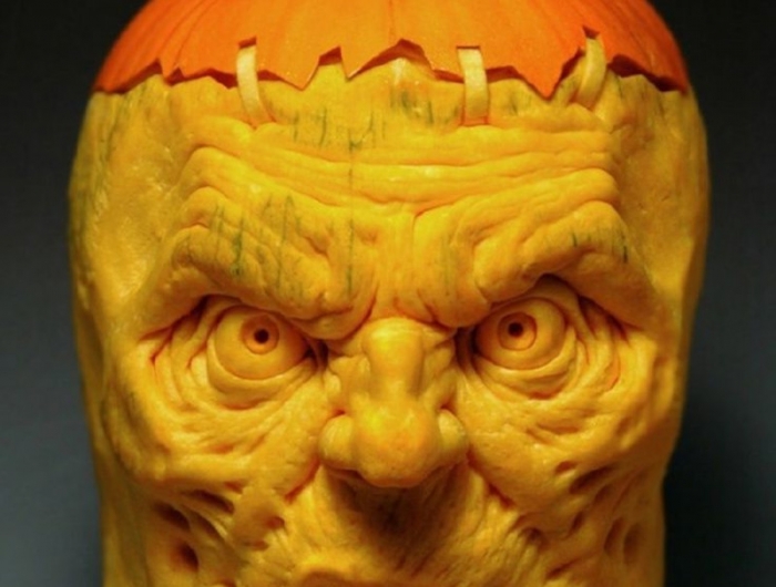 decoupe citrouille halloween visage d homme qui fait peur réaliste tete originale