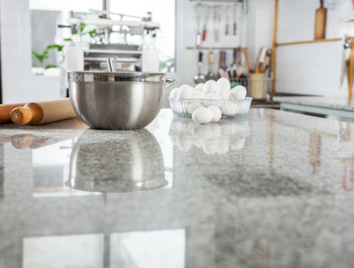 ingredients on marble countertop in commercial kitchen