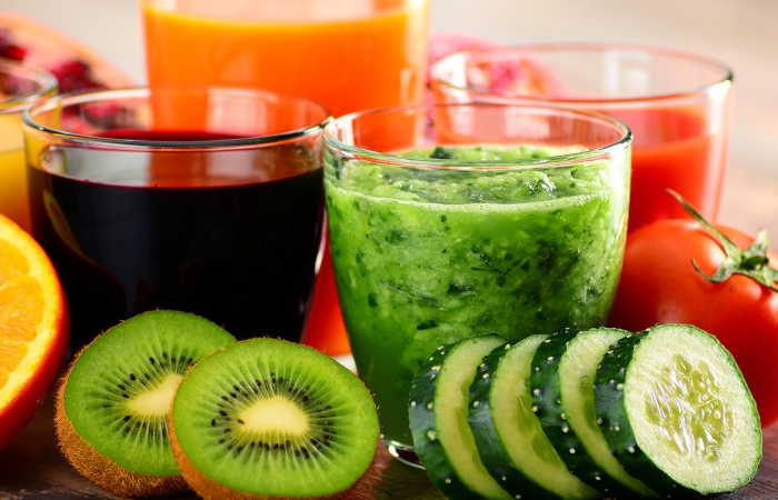 glasses of fresh organic vegetable and fruit juices