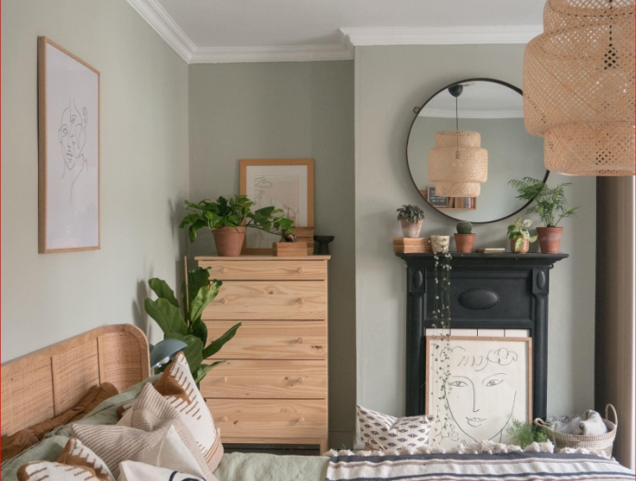 chambre vert sauge linge de lit coussins décoratifs meubles bois