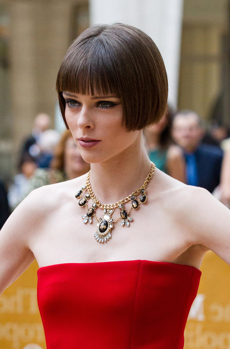 Short square haircut with straight bangs red dress