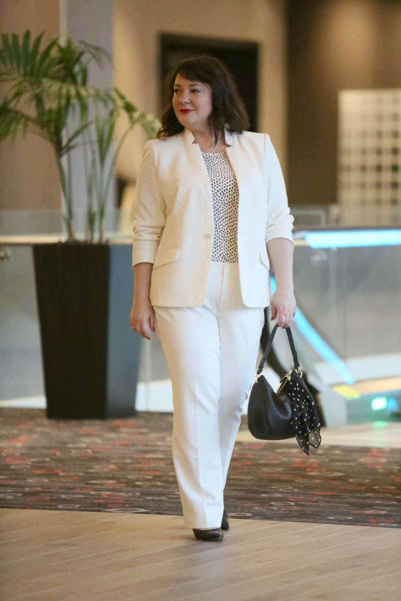 chic round woman fashion white pants and jacket elegant top