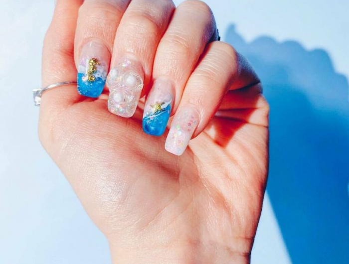 modele nail art ocean original ongles été 2022 dessin vagues motifs 3d