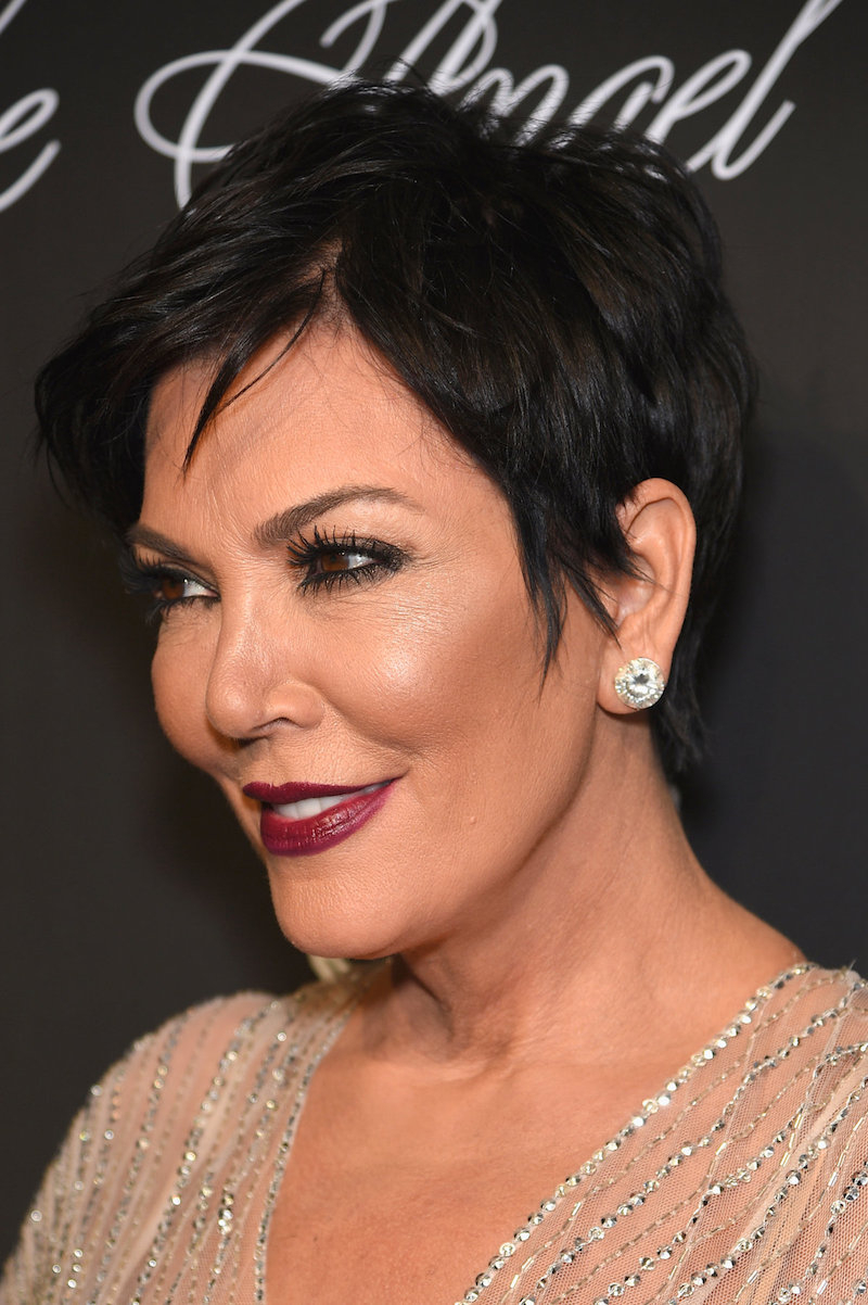 Example of a short haircut for a 60-year-old woman coloring black hair