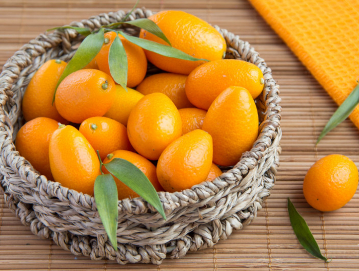 fruit exotique kumquat panier plein de fruits oranges kumquats