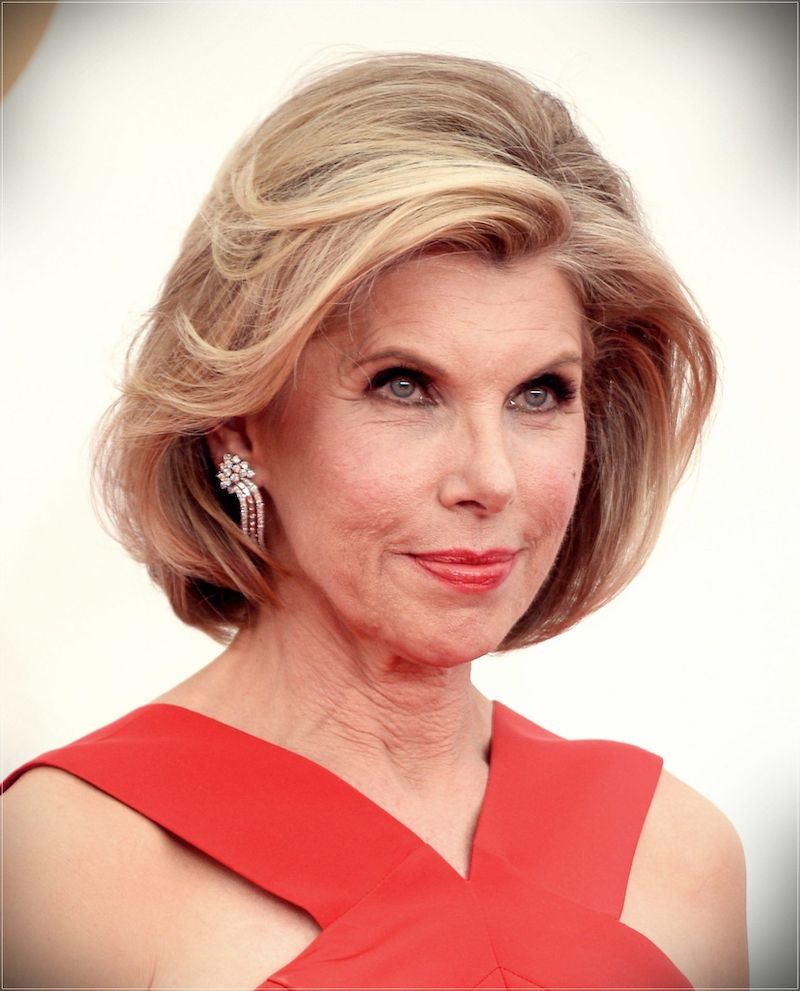 Blooming 60-year-old woman's hairstyle with a side parting and subtle gradient