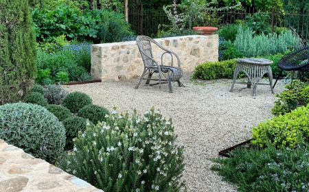 amenagement paysager meubles de jardin cloture pierre arbustes