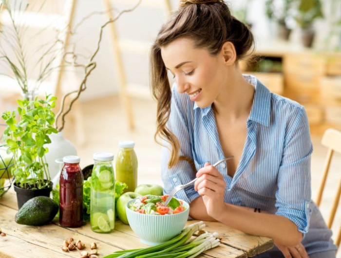 woman eating healthy salad