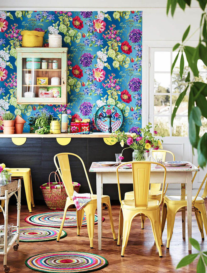 bohemian kitchen furniture in bright colors floral wallpaper