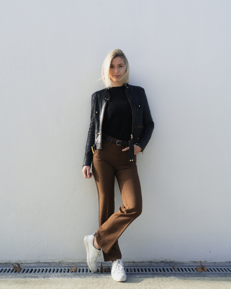 high waisted brown trousers black faux leather jacket black blouse
