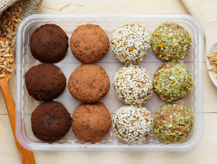 balls from ground wheat sprouts with sesame, pumpkin seeds and