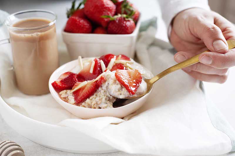 Diet Strawberries Strawberries in a yogurt in a spoon