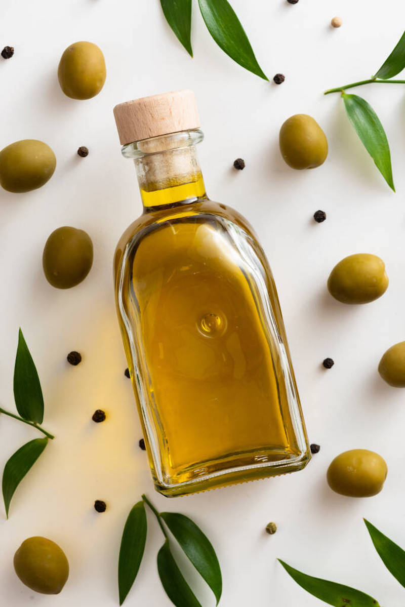 olives oil bottle table. high quality photo