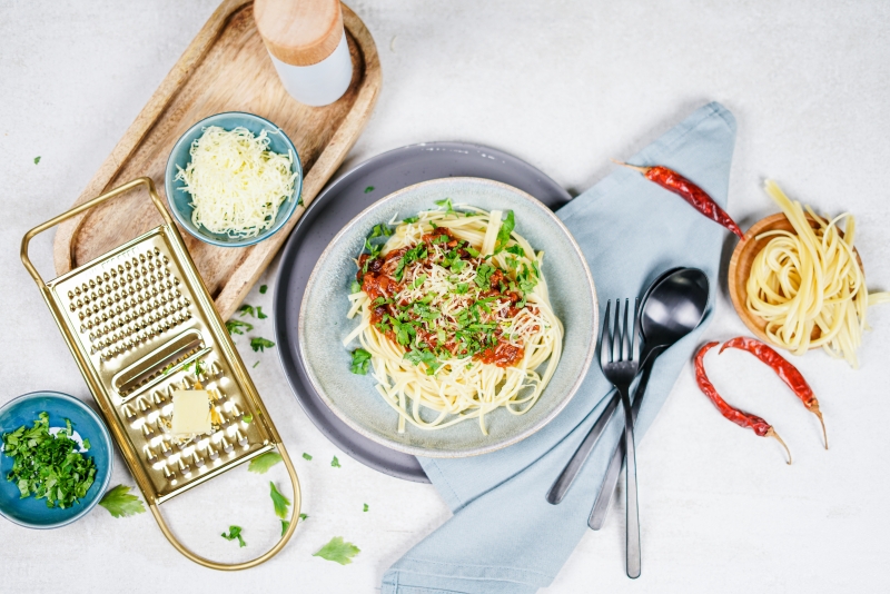 chilli con carne over pasta fresh coriander