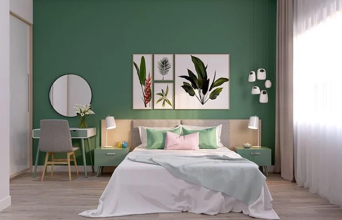 chambre a couher avec un grand lit mur couleur sauge vert