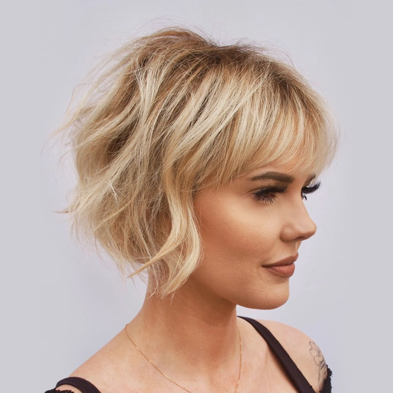 Distressed square blond hair with volume on the back