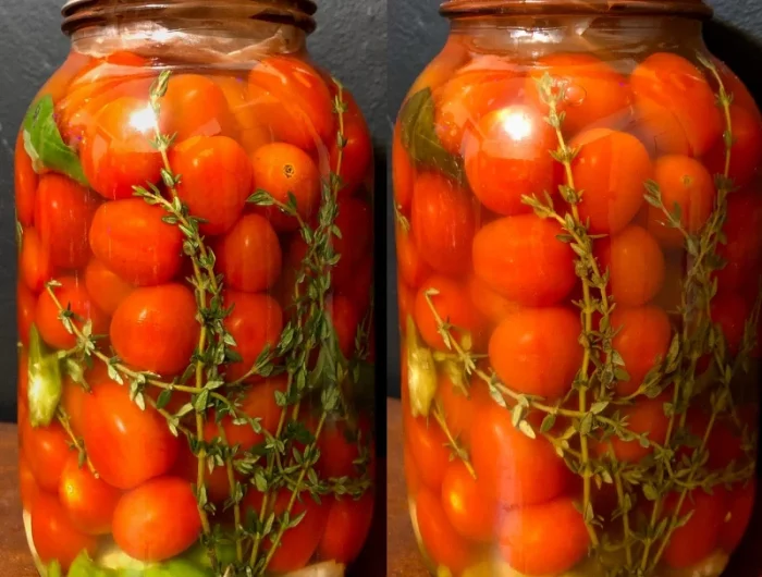 des bocaux en verre avec des tomates entieres ded