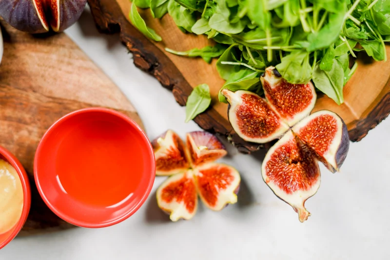 are fresh figs good for health.  Red bowl salad with sliced ​​figs