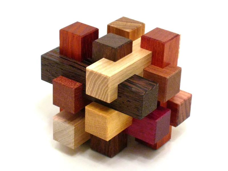 casse tete enigme puzzle en bois de differentes couleurs