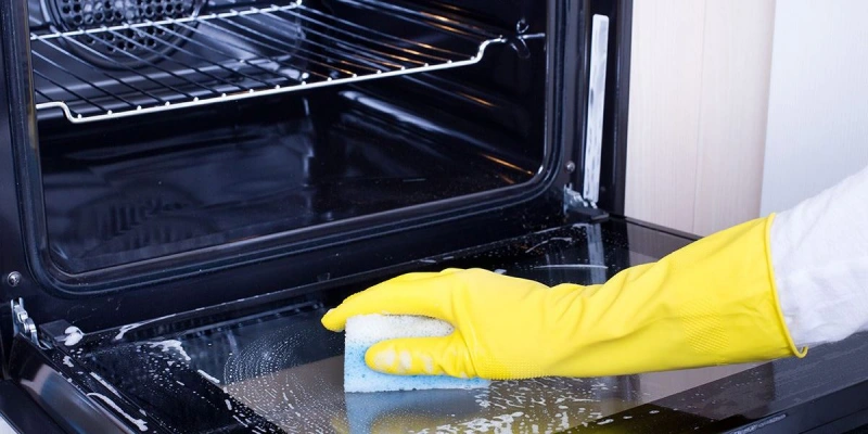 Oven glass cleaner soapy water protective gloves
