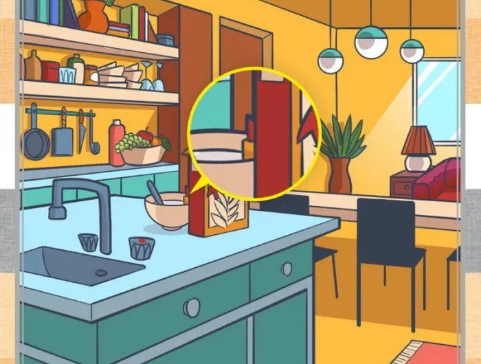 zoom sur un objet pose sur le plan de travail de la cuisine a cote de la salle a manger peinte en jaune