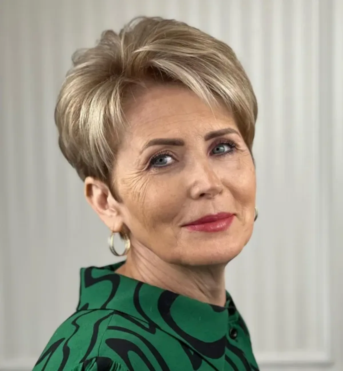 60 year old woman pixie cut with blonde highlights