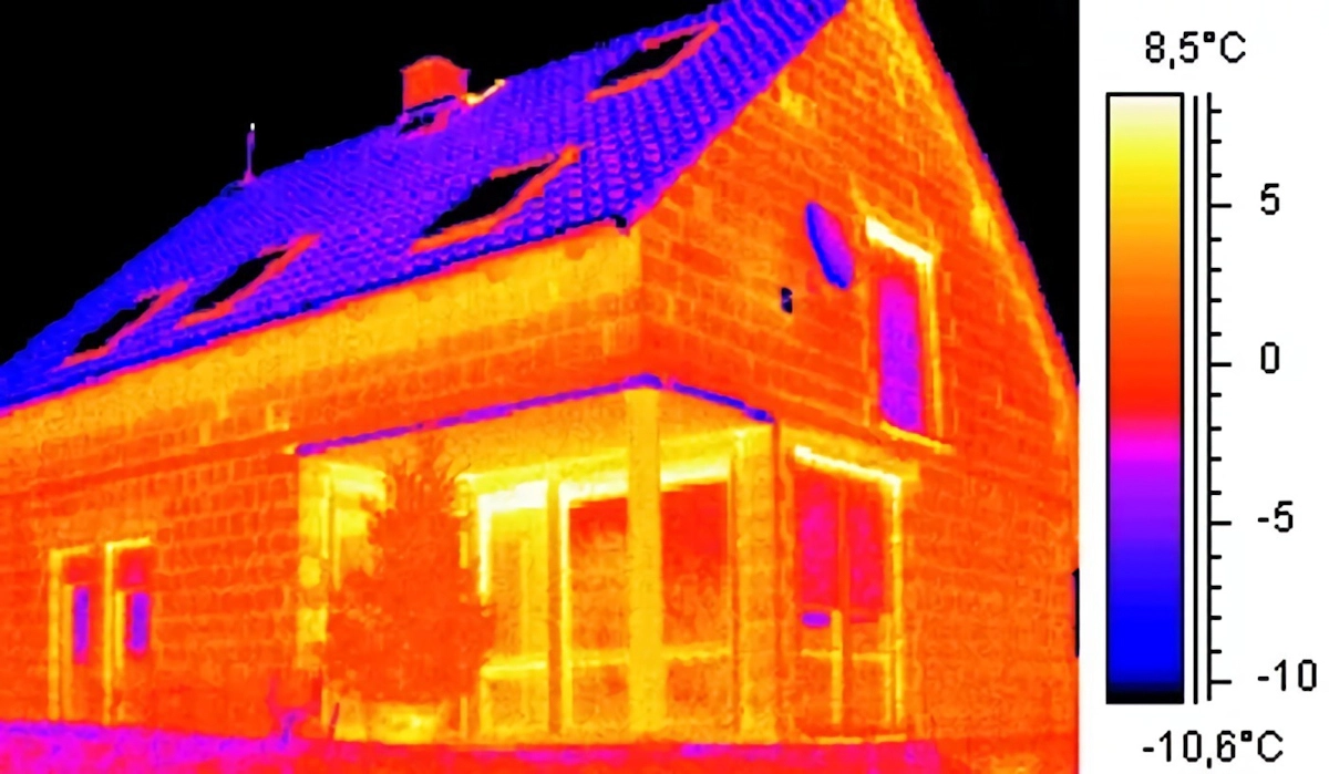 les echanges thermiques des materiaux de la maison vers un extérieur froid avec un thermometre pour désigner les temperatures en couleurs