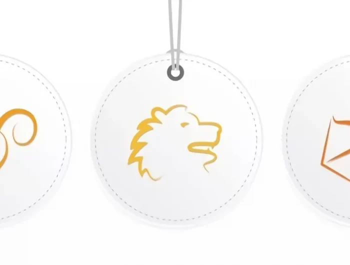 medallons blancs avec les symboles des signes de feu belier lion et sagittaire aux traits jaunes oranges sur fond blanc