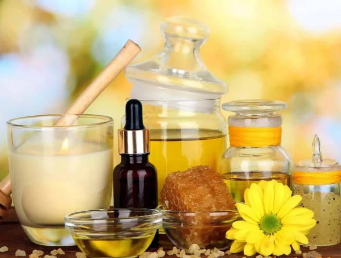 produits doux et naturelles pour les cheveux dans les tons jaunes avec une fleur jaune et des huiles