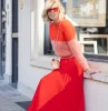 quel top porter avec une jupe longue rouge.jpg