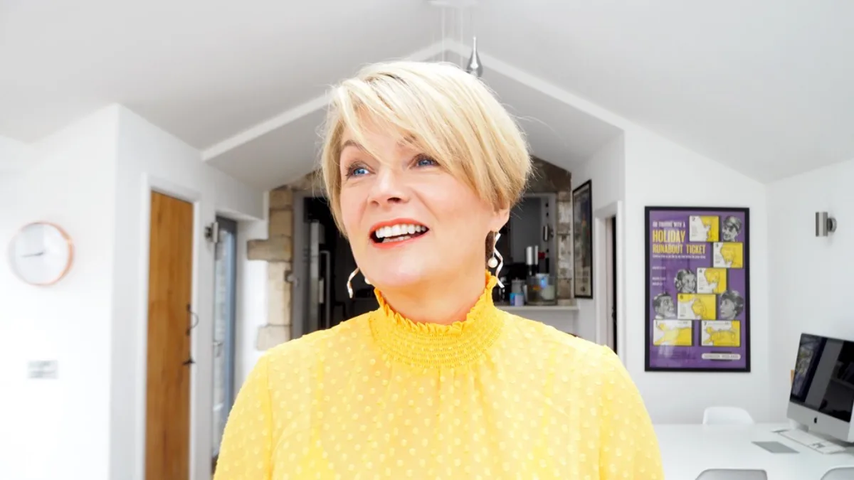 short pixie cut for 60-year-old woman with side bangs