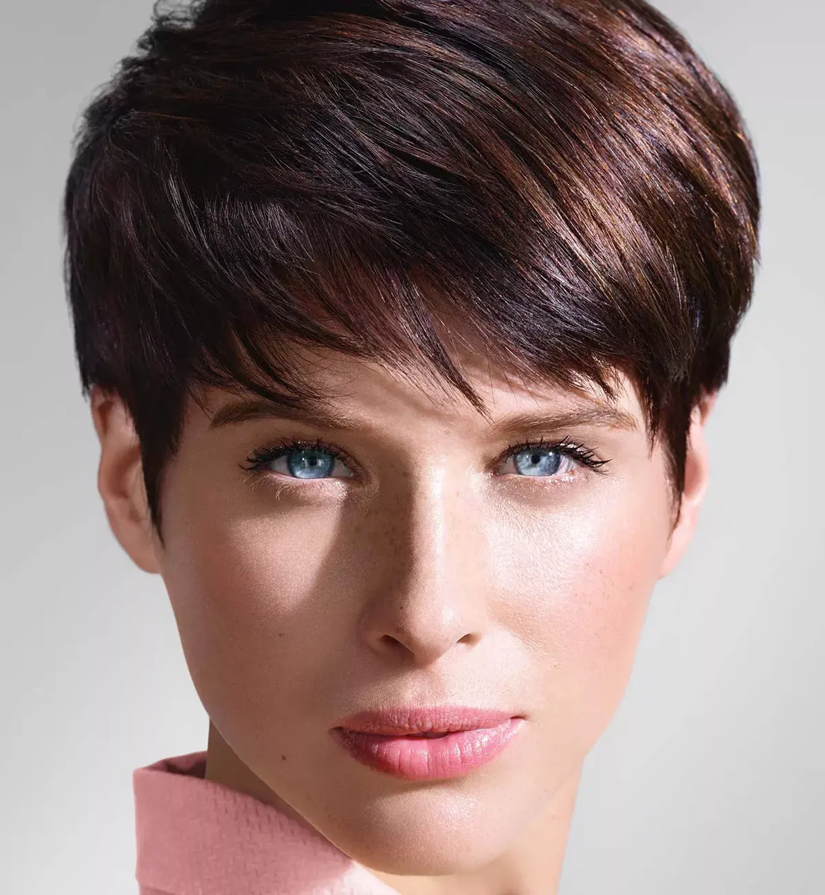 blue-eyed brunette with pixie cut how to style it