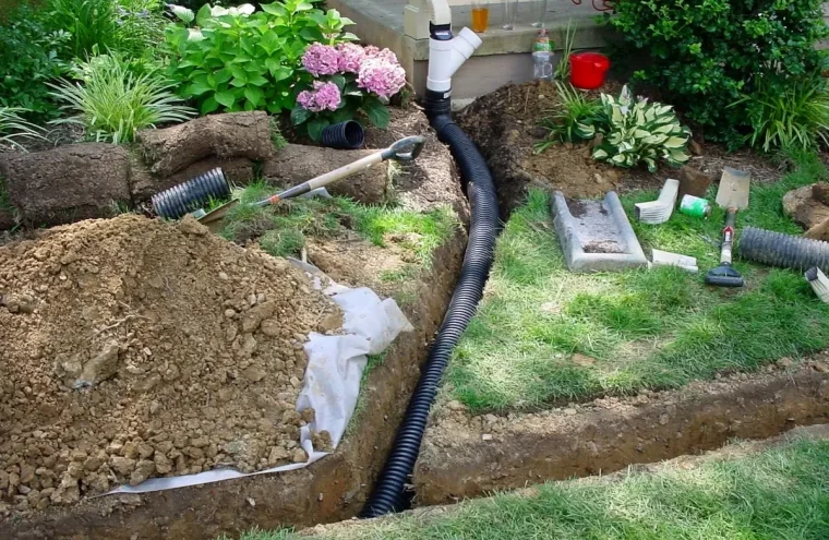 installation systeme drainage tuyau eau s ecouler gazon herbe