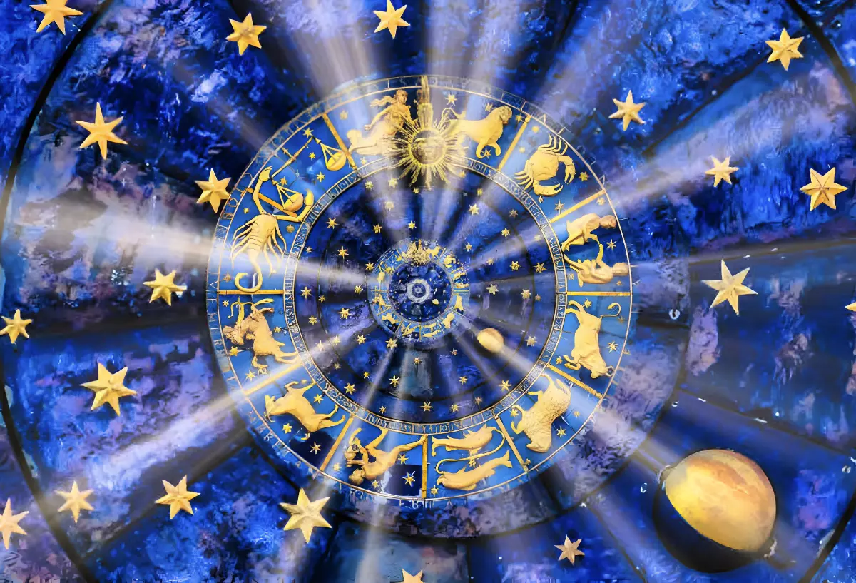 le cercle do zodiaque avec des signes dores et des rayons qui sortent du centre sur fond bleu et des etoiles dorees