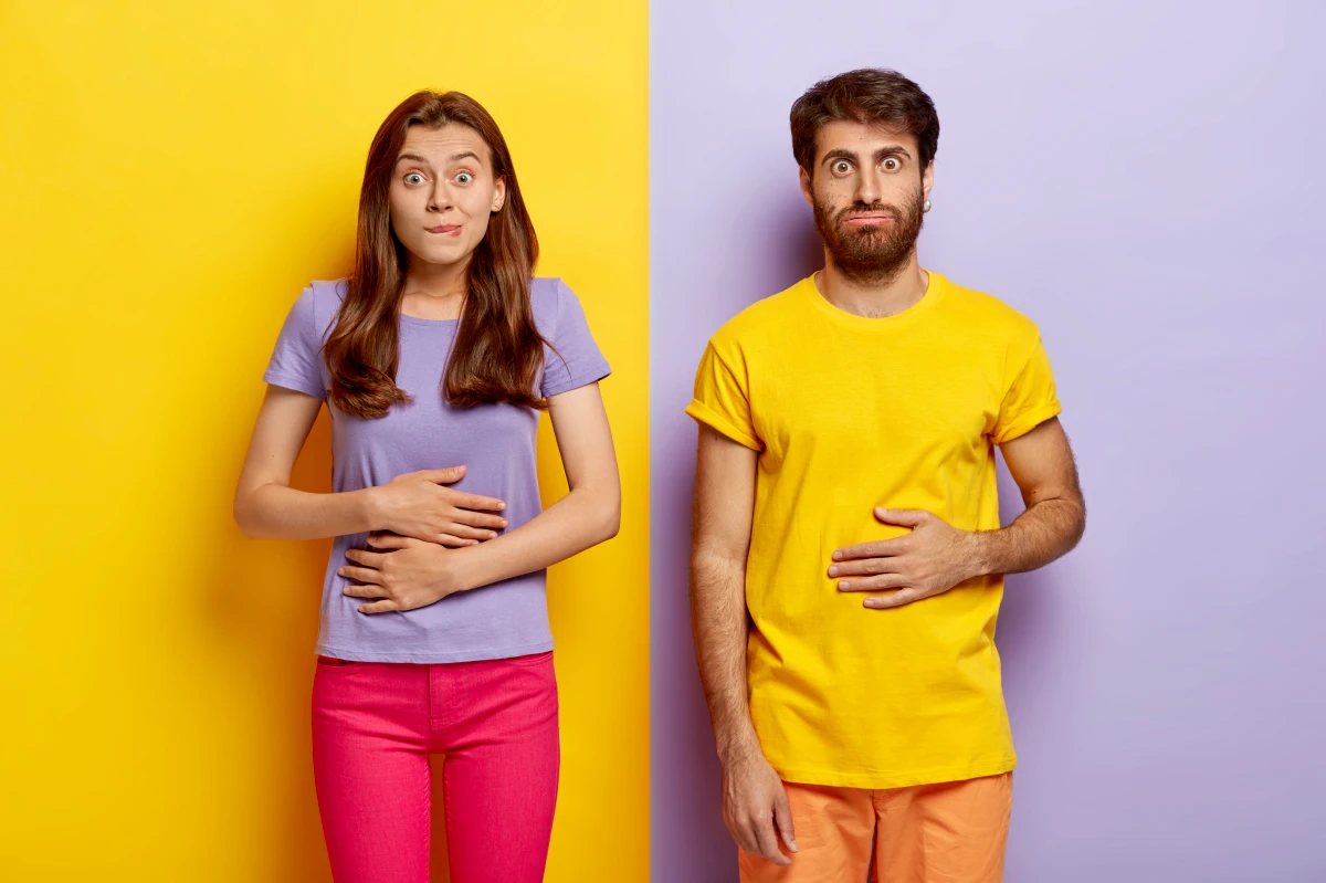 problemes de digestion symtomes homme et femme jaune rouge