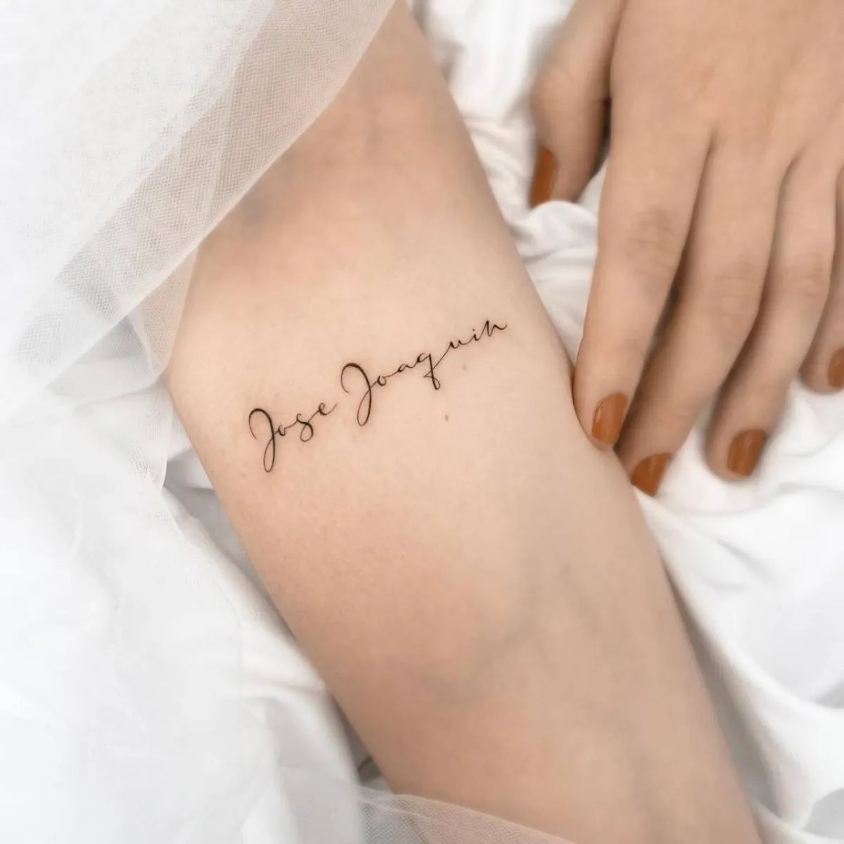 tatouage hose joaquin sur l arm d une femme