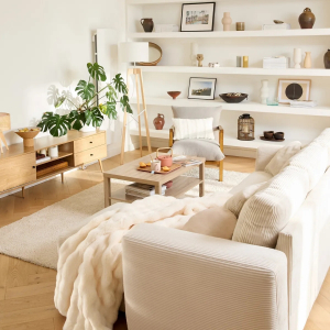 canape blanc casse plaid en laine coussins meuble tv en bois lampadaire