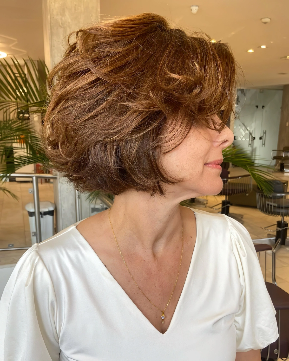 coupe butterfly femme 50 ans cheveux en degrade couches