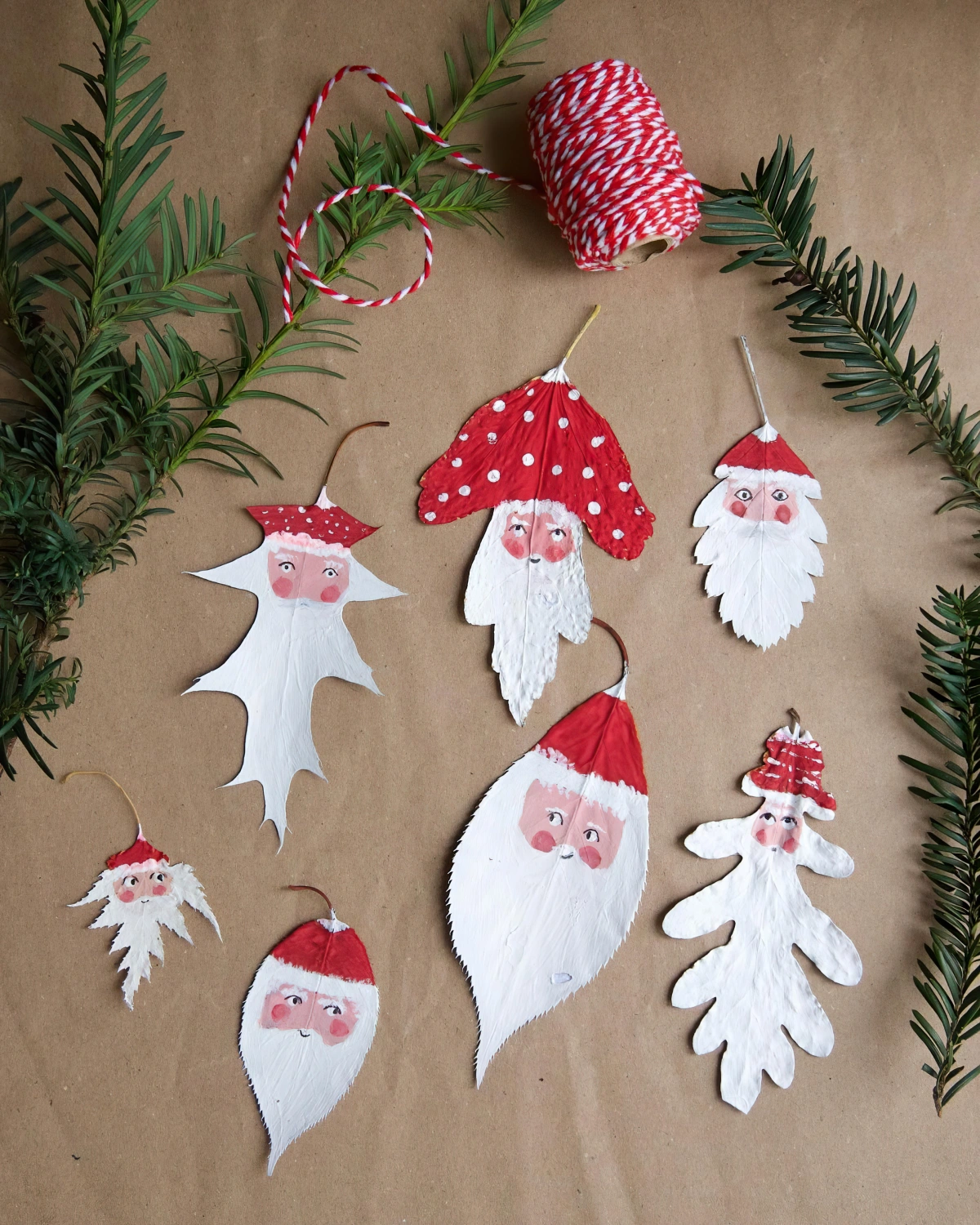 diy peinture feuilles motifs pere noel surface papier kraft branches