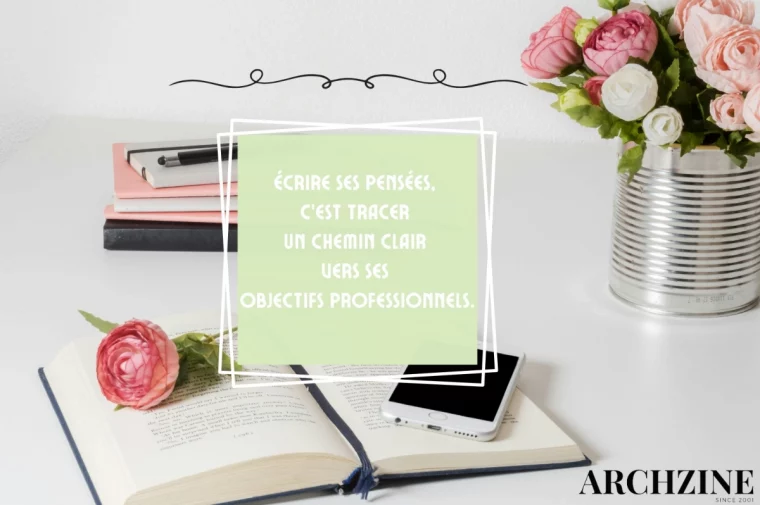bureau blanc livre telephone vase bouquet fleurs citation developpement personnel